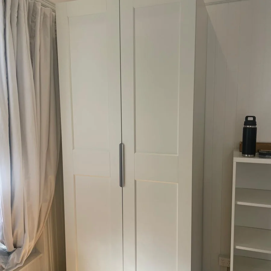 Assembled flat pack wardrobe in a Brisbane bedroom